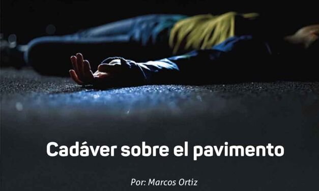 Cadáver sobre el pavimento